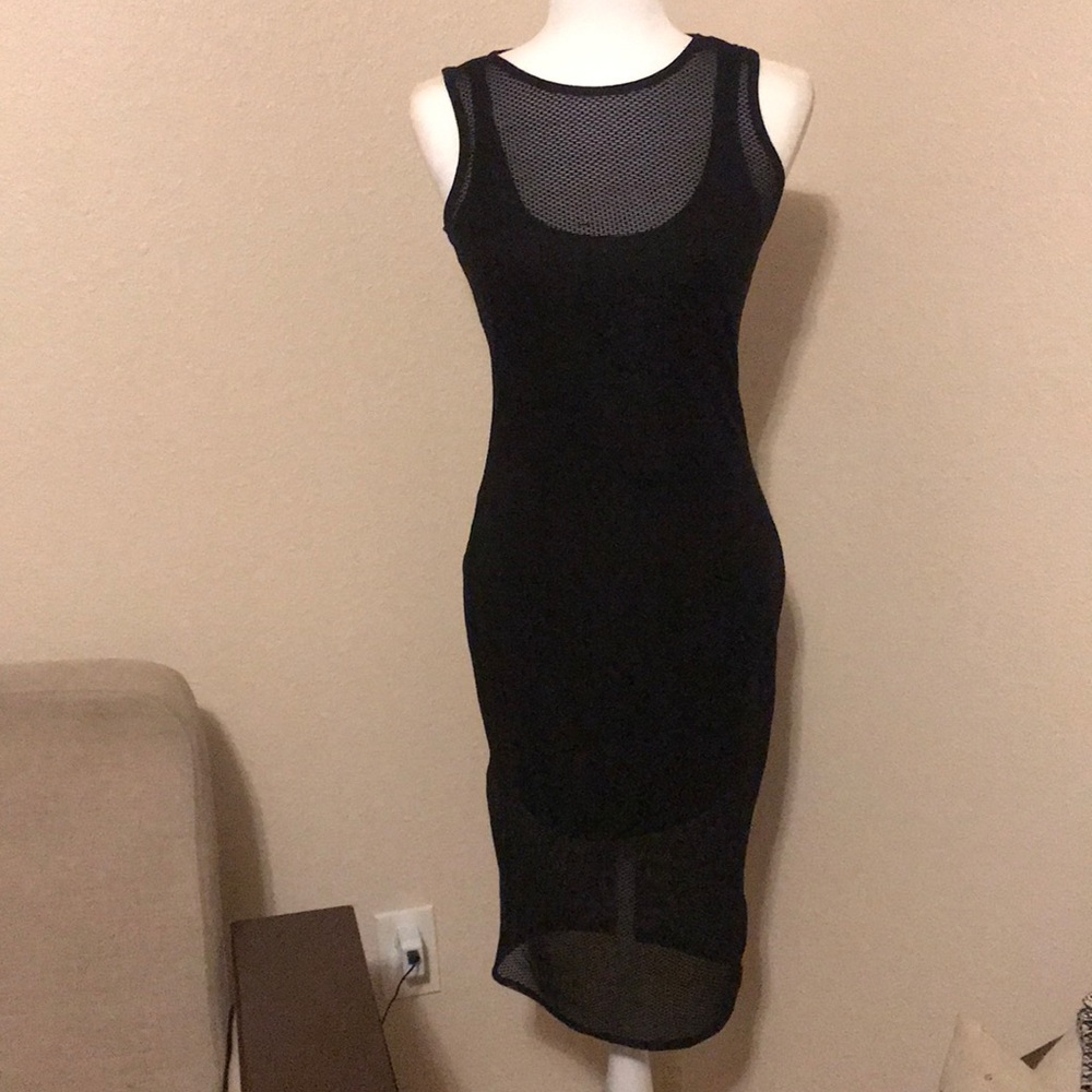 Short Black netted dress. Never worn, tags on